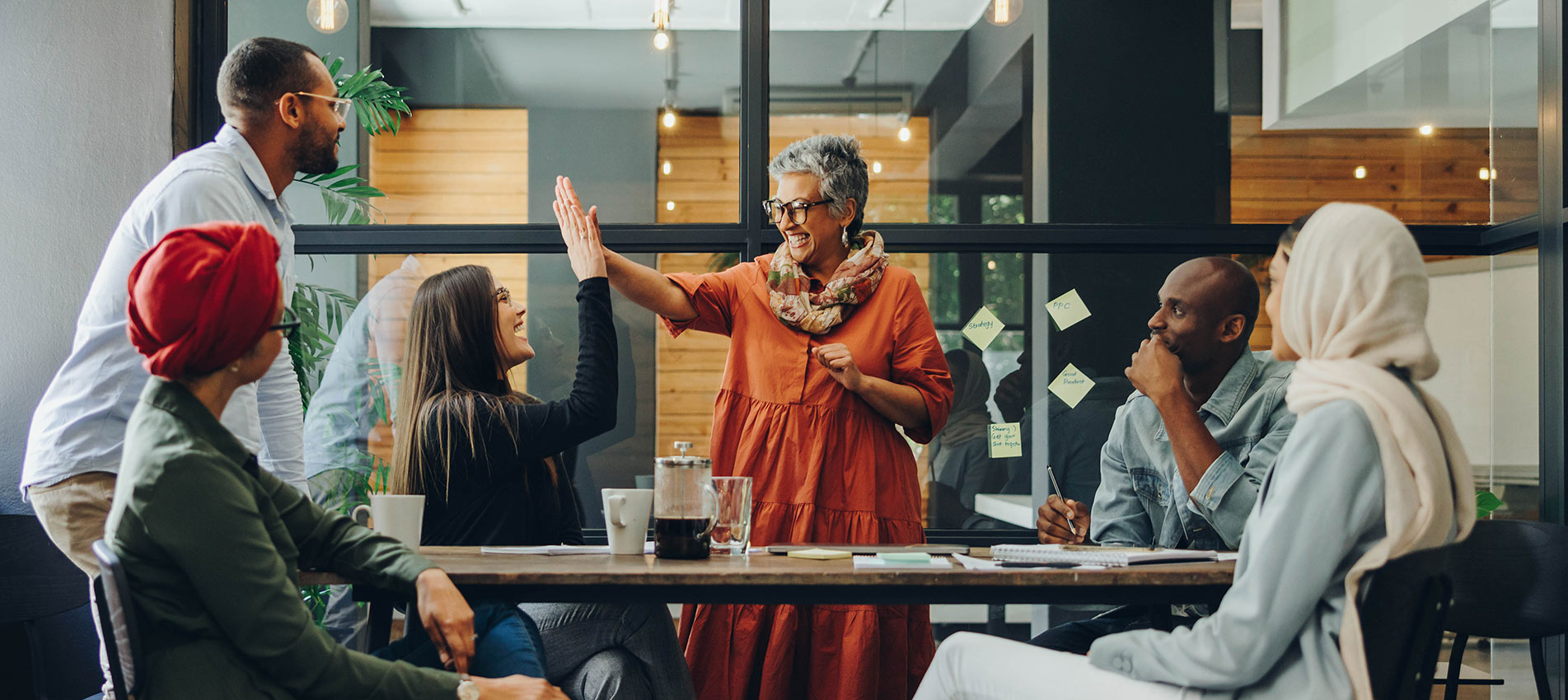 Happy Businesspeople Working As A Team In A Multicultural Workplace