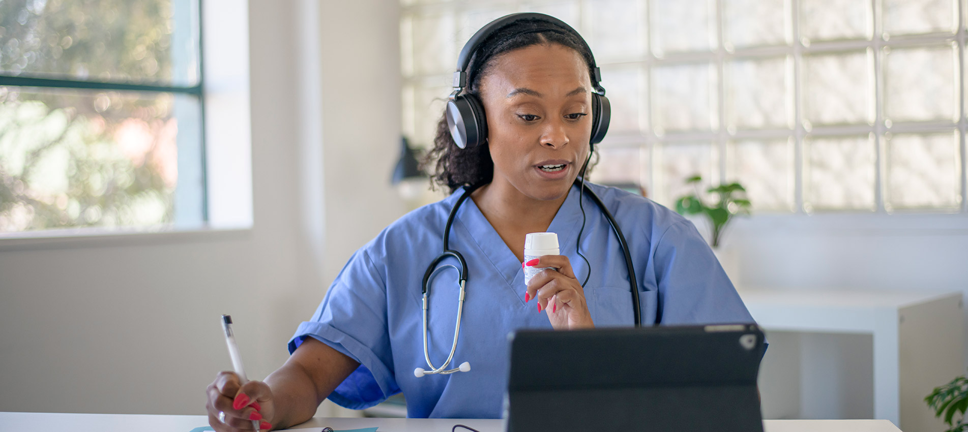 Female Doctor Working At Her Office Doing Telemedicine Services