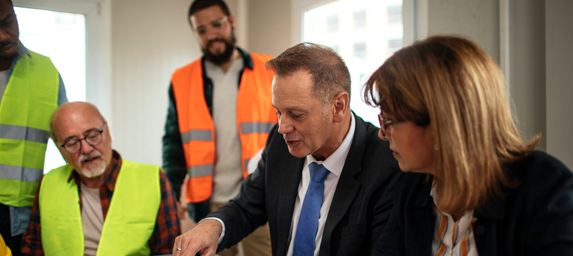 Board Directors Having A Meeting With The Team In The Office At The Construction Site