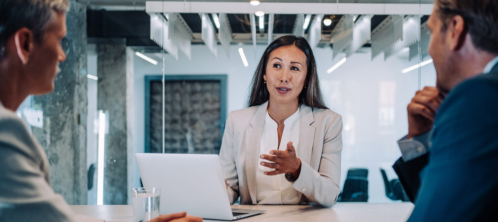 Group Of Business Persons Talking In The Office