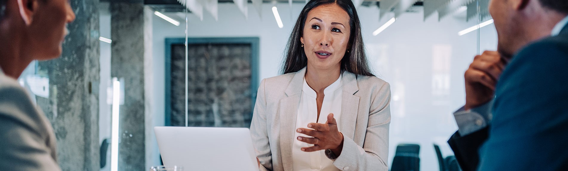 Group Of Business Persons Talking In The Office
