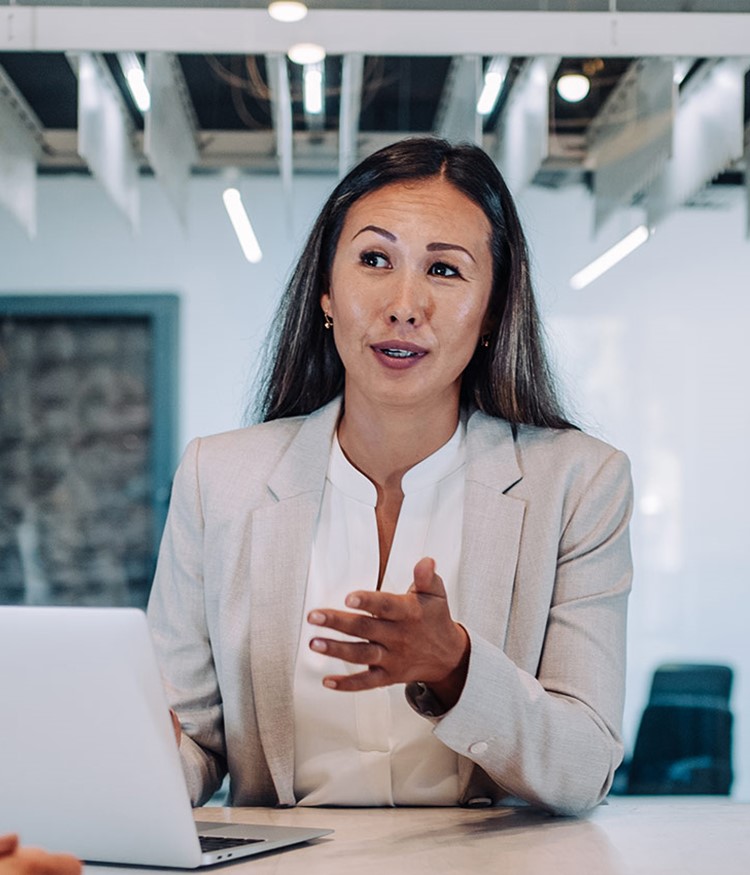 Group Of Business Persons Talking In The Office
