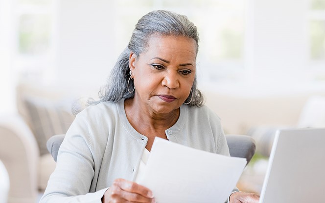 Serious Senior Widow Worried About Home Finances