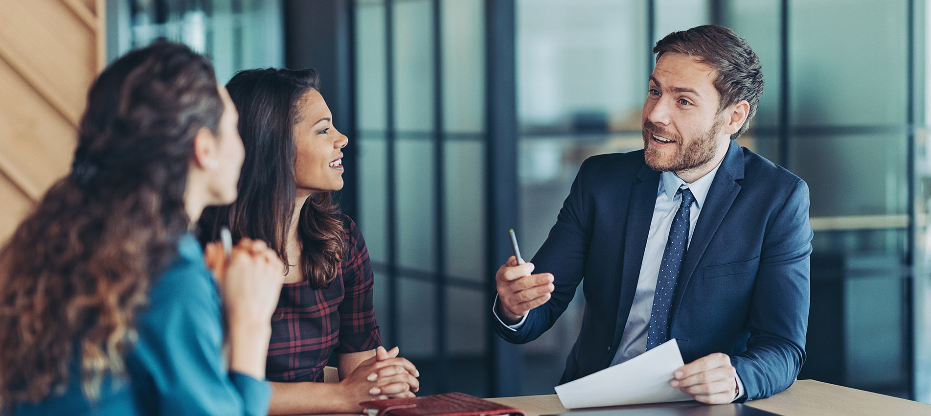 Business Persons During A Meeting In The Office