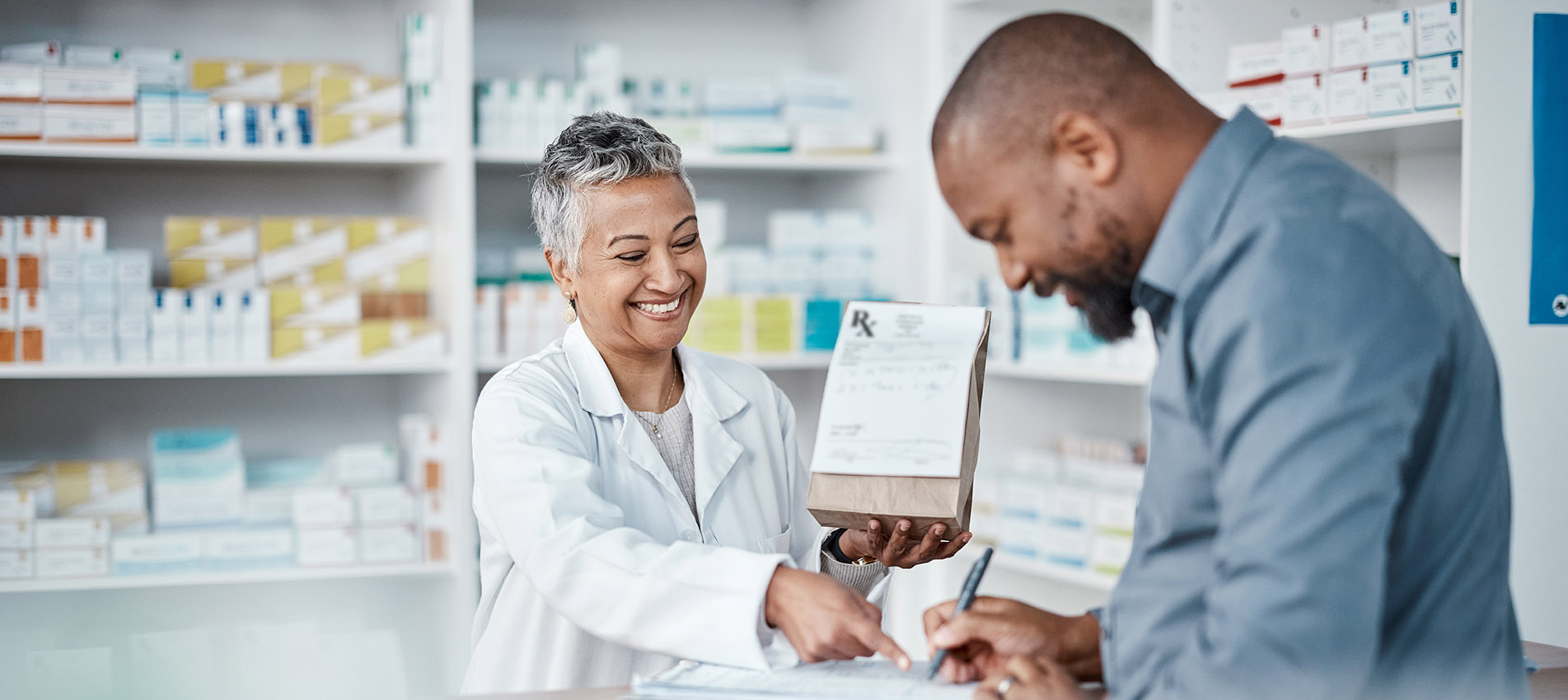Pharmacist Assisting Man