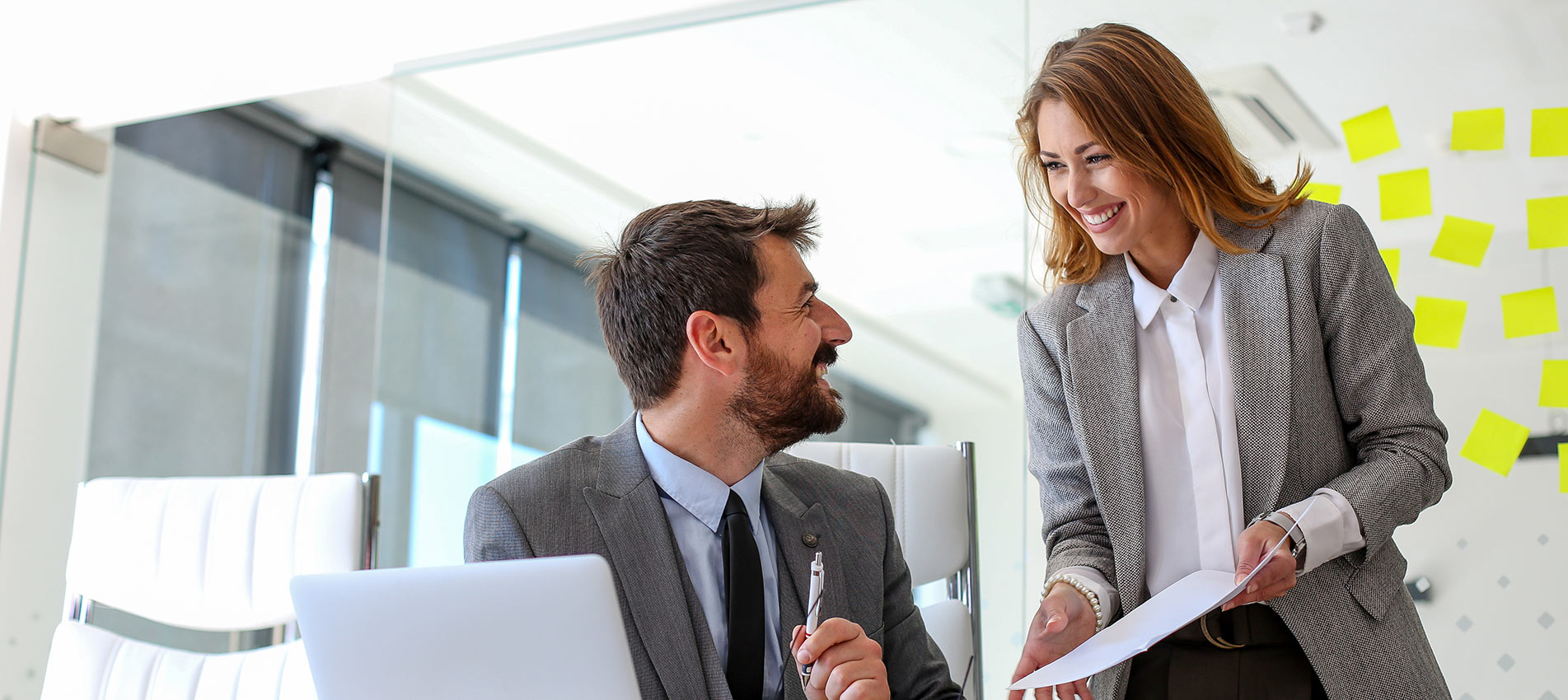 Two Employees Of The Company Consult About New Work Responsibilities