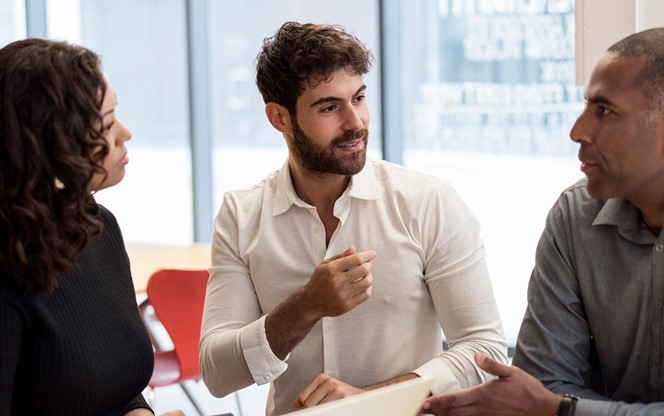 Business People Discussing In Meeting At Office