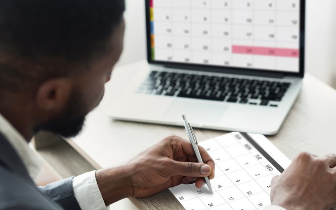 Business Person With Calendar Gettyimages 1287829341