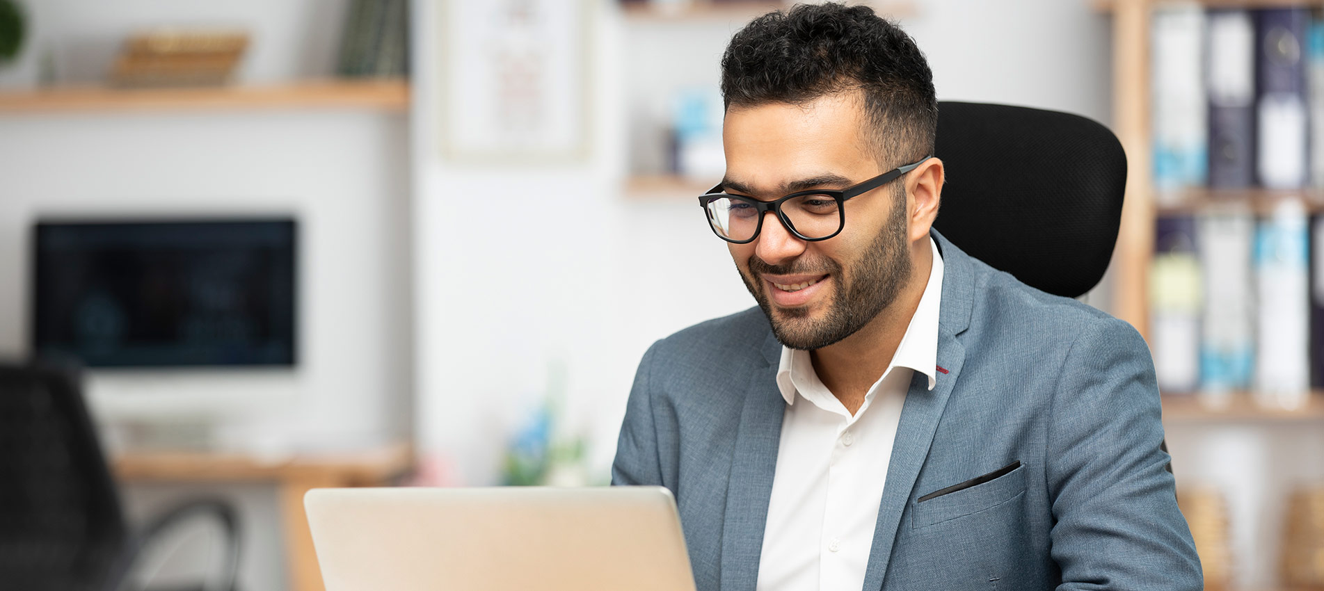Young Businessman Working In Office