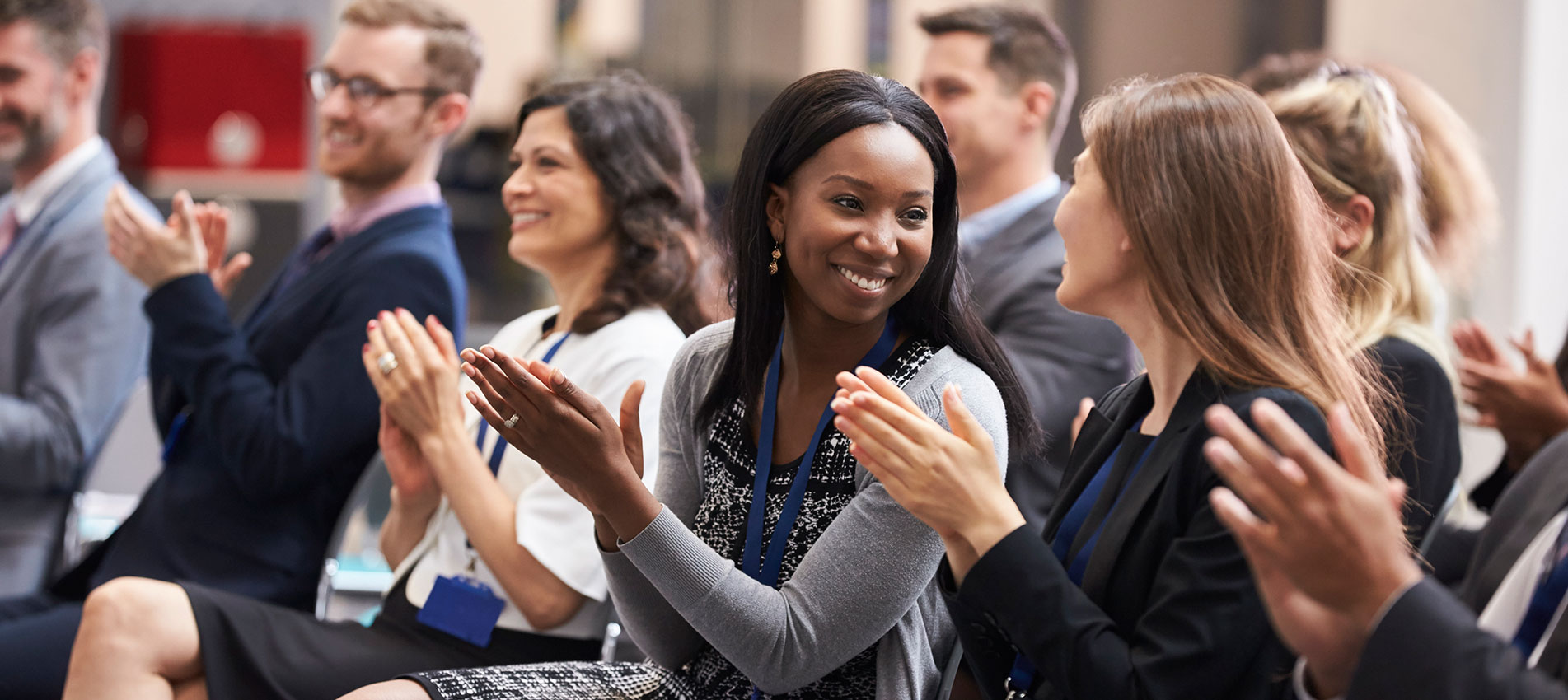 Audience Applauding Speaker After Conference Presentation