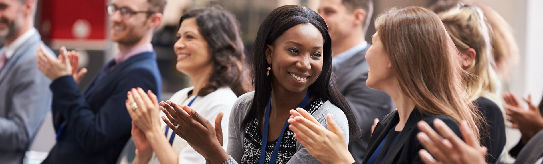 Audience Applauding Speaker After Conference Presentation