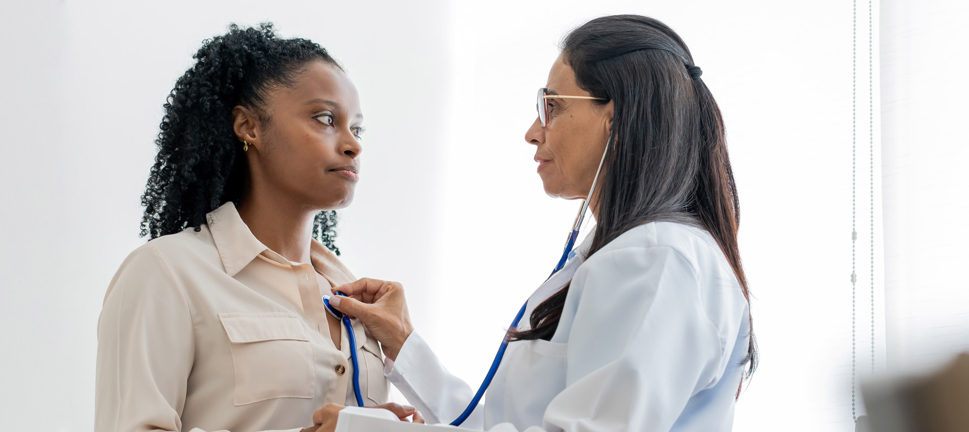 Medical Doctor Attending To A Female Patient