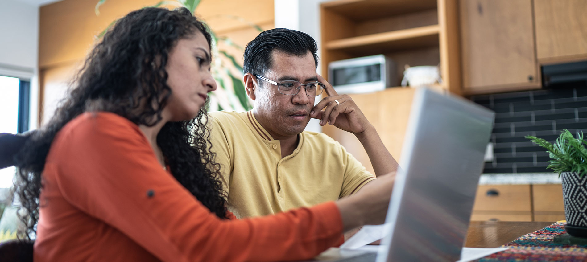 Worried Couple Using Laptop Doing Home Finances