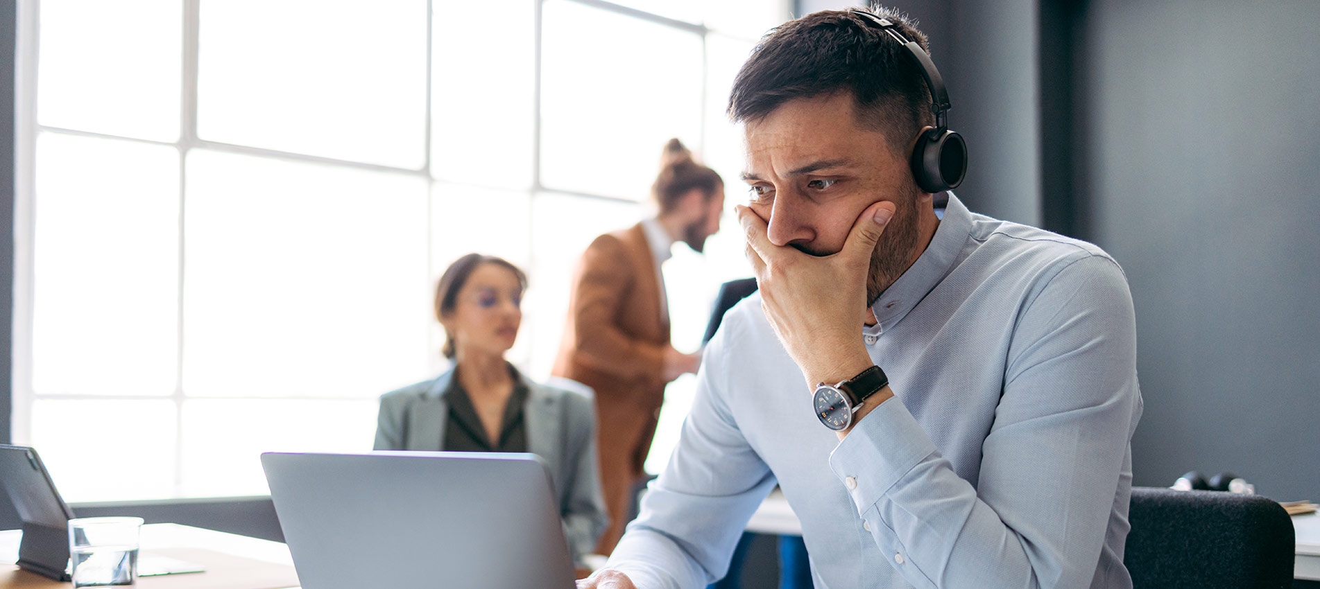 Worried Business Man Talking On A Video Call In A Modern Office