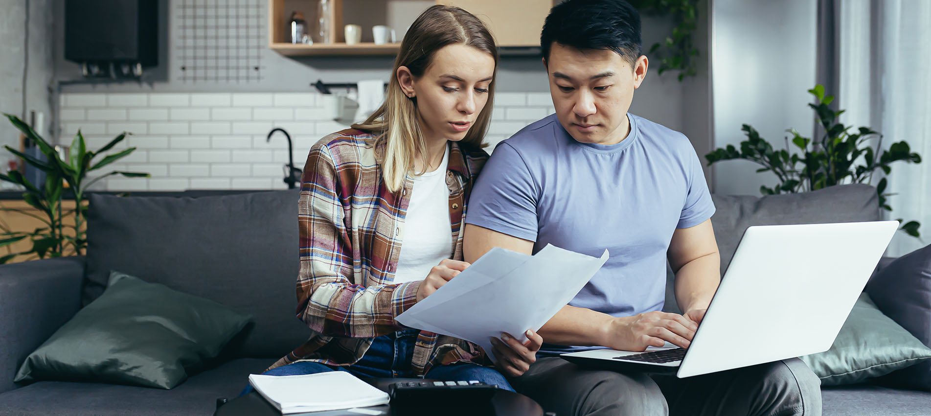 Young Couple Reviewing Documents