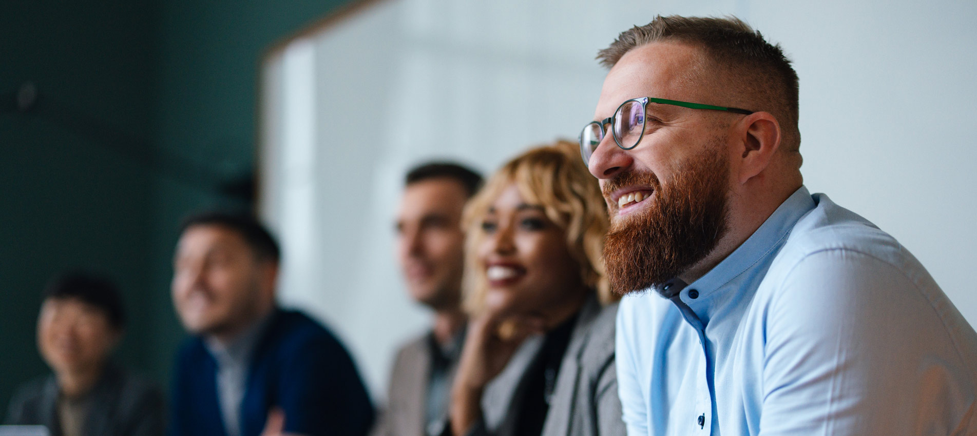 Businesspeople Listening To A Presentation