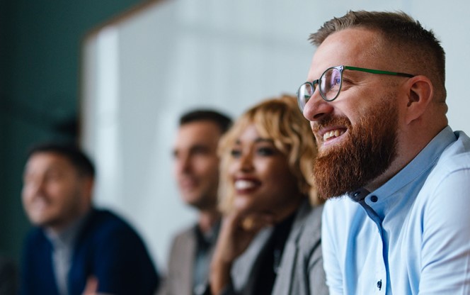 Businesspeople Listening To A Presentation
