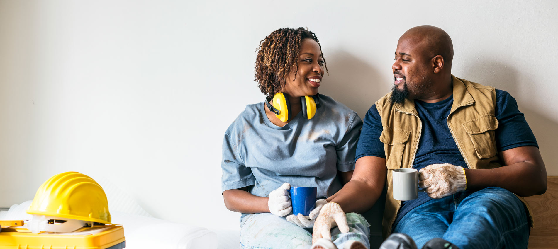 African American Male Construction Worker With Spouse