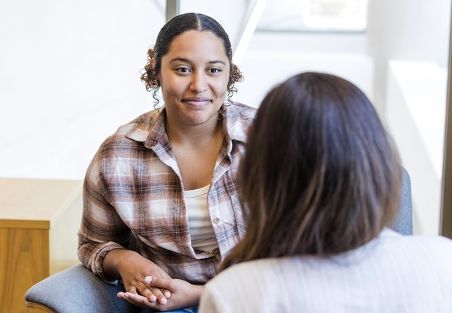 Young Latin Female Meeting With Her Therapist