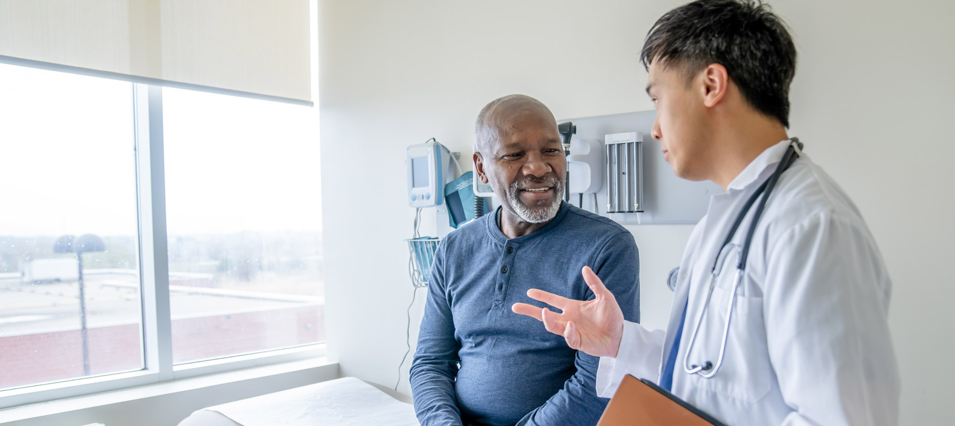 African American Senior Man Having His Medical Exam With A Doctor