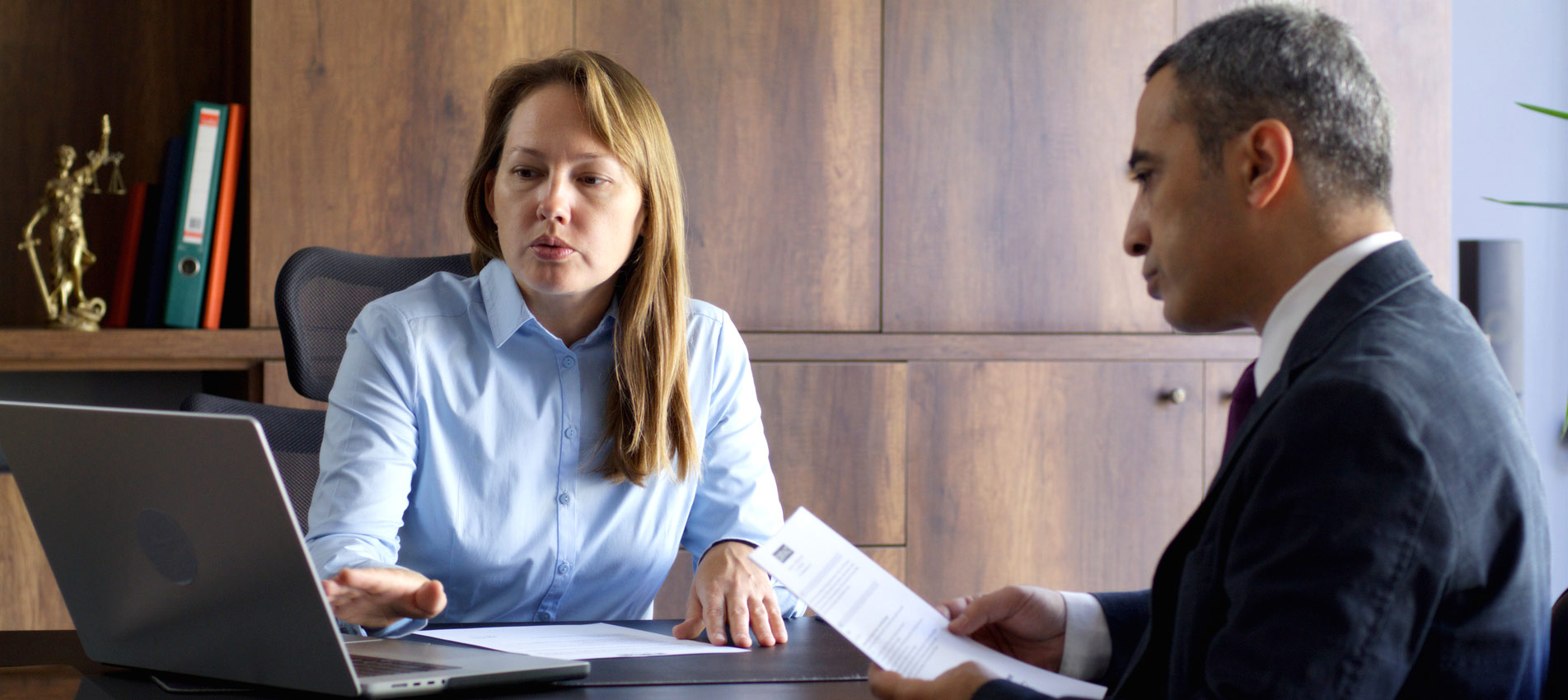 Lawyer And Business Person Discussing In The Office