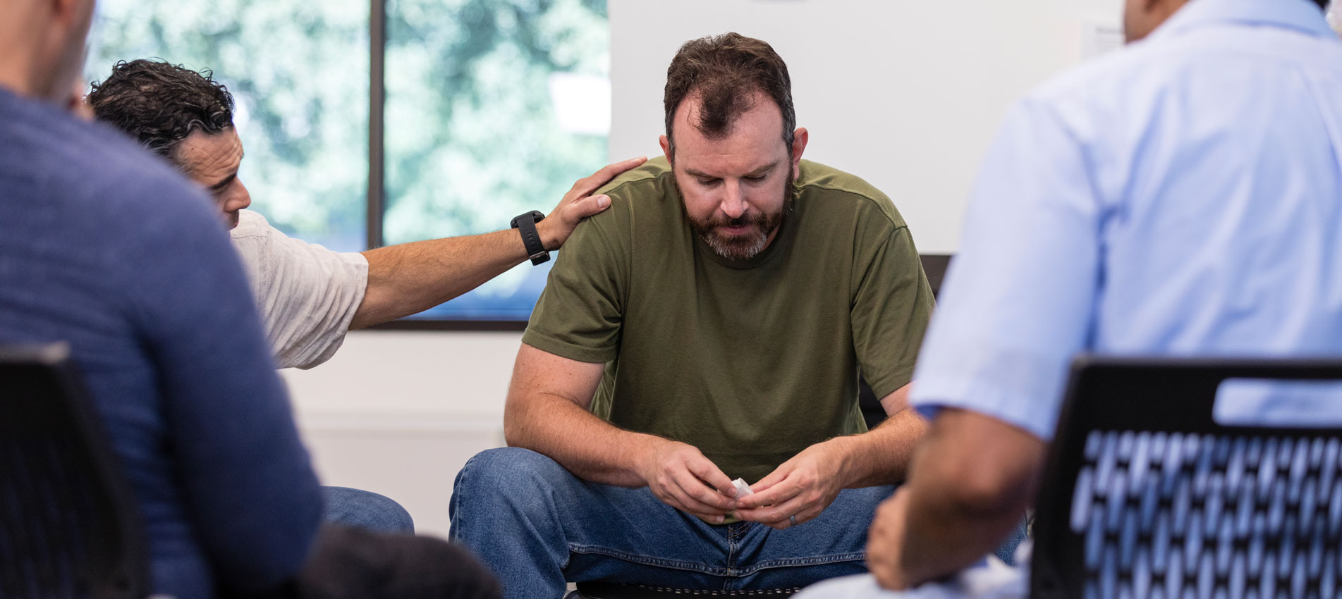 Male Therapist Encourages Distressed Male Veteran