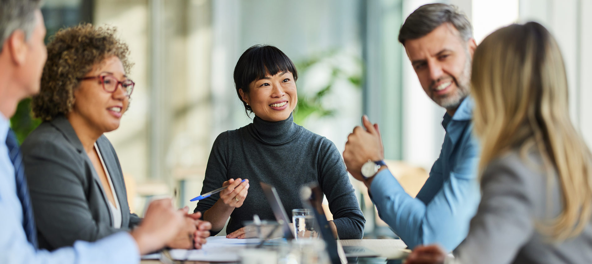 Multiracial Business Team Talking On A Meeting In The Office