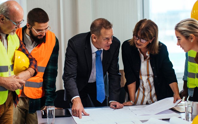 Meeting With The CEO In The Office At The Construction Site