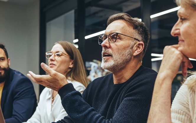 Businessman Leading A Discussion In A Boardroom