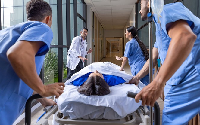Nurses Taking Patient To An Emergency Room