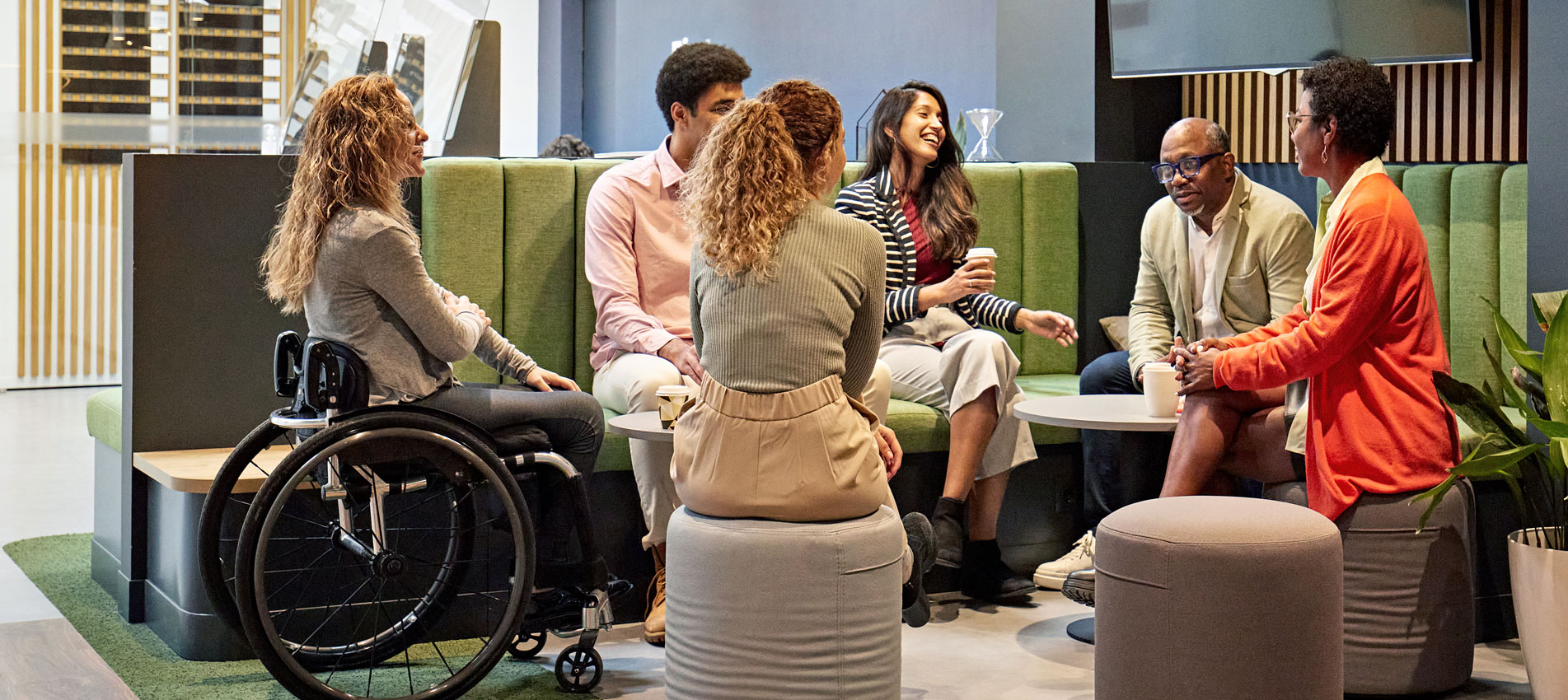 Business Team Meeting In Modern Office Sitting Area