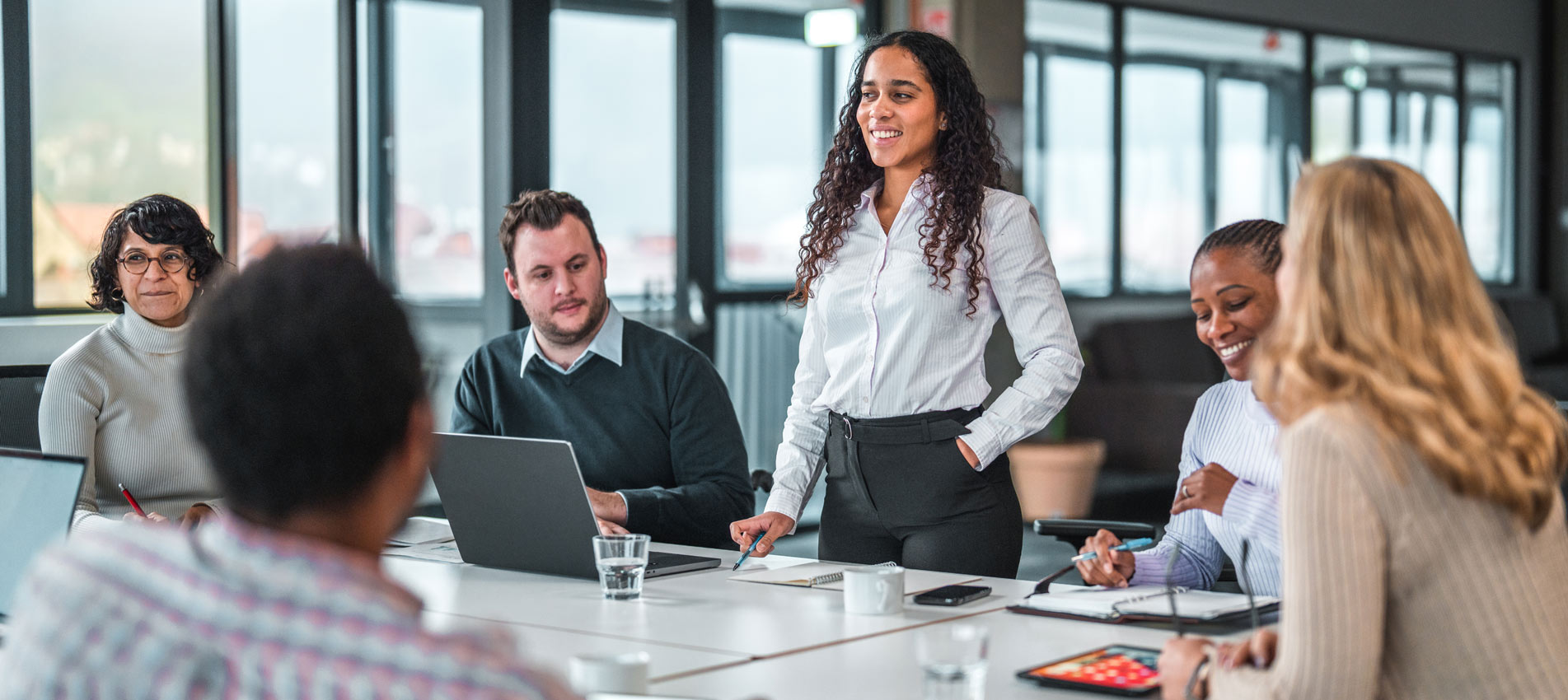 Group Of Mixed Race Business People Are Discussing