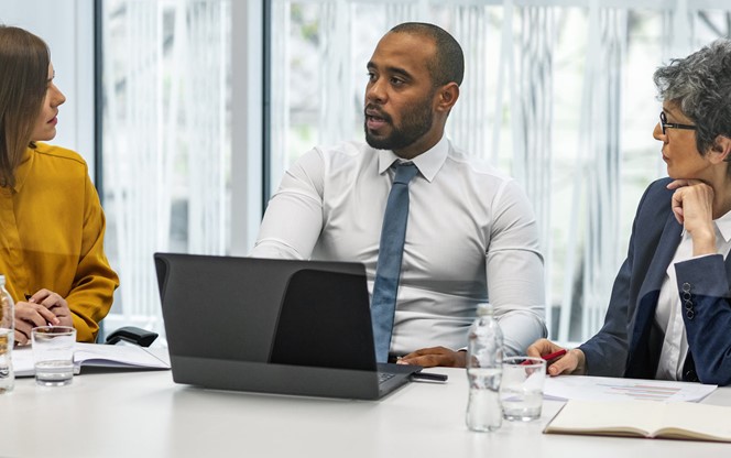 Business People Having Meeting In A Conference Room