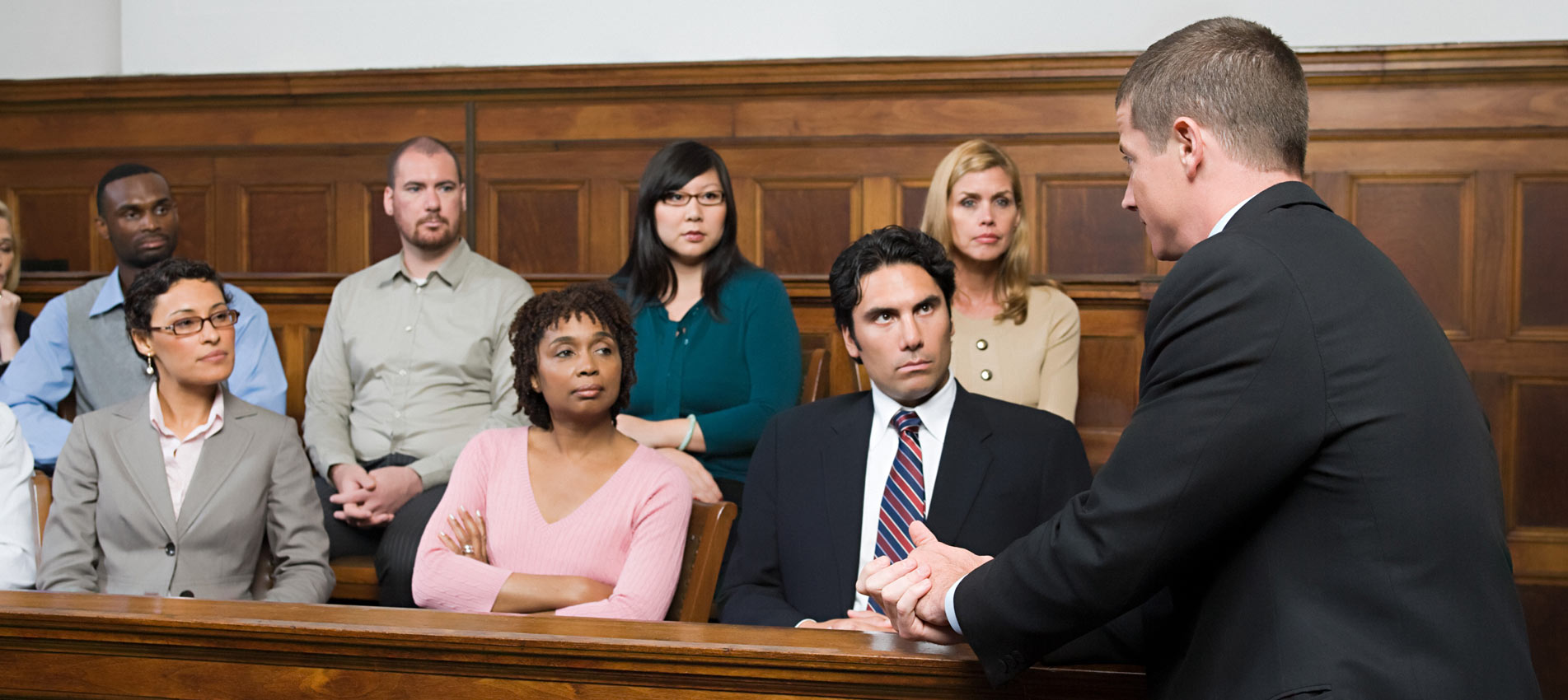 A Lawyer And The Jury In A Courtroom