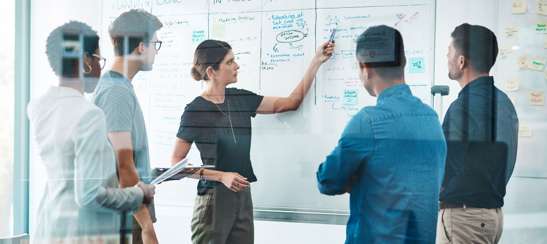 Businesspeople Having A Meeting Sharing Ideas On A Project