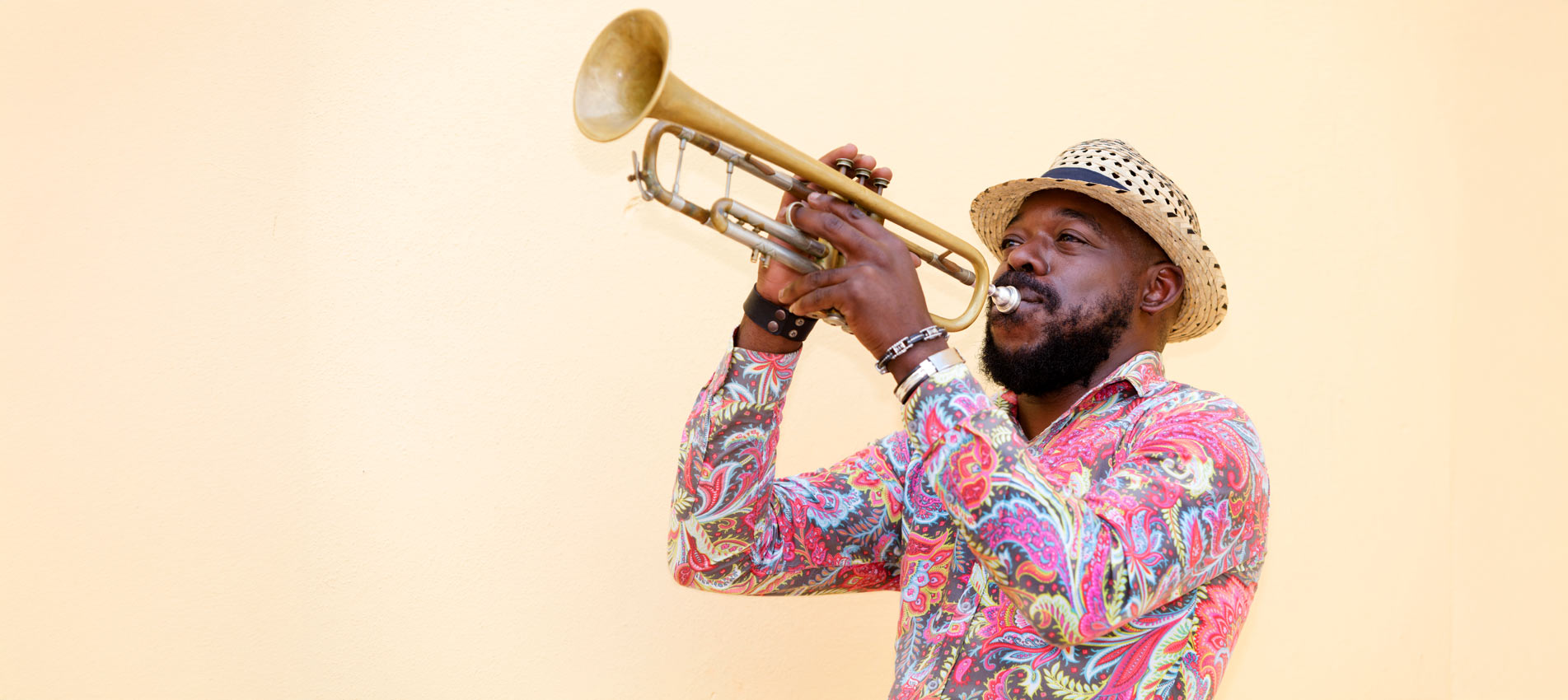Cuban Musician Playing A Trumpet Outdoors