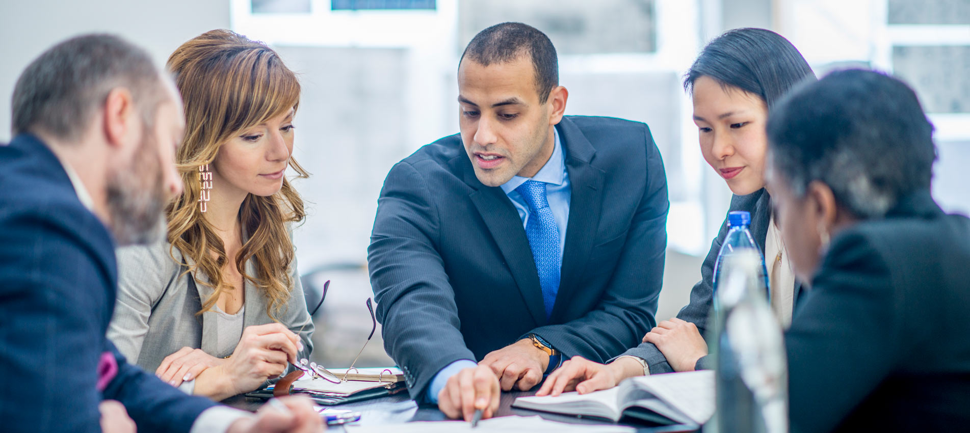 Multi Ethnic Group Of Businesspeople Collaborating In The Office